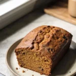 Pumpkin Spice Latte Cake with cream frosting and autumn decorations